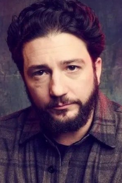 Джон Магаро