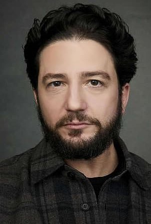 Джон Магаро